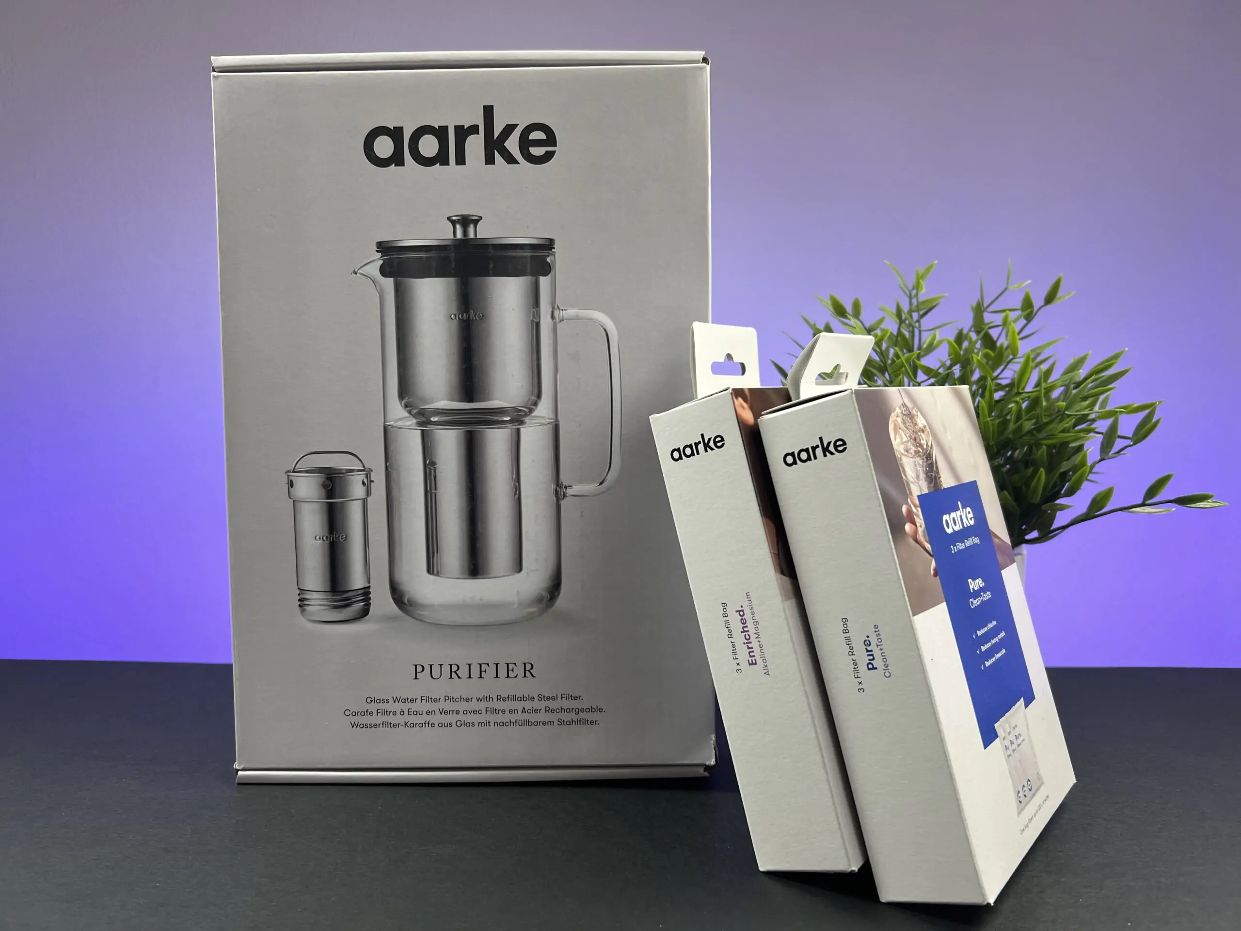 Aarke Purifier, Caraffa Filtrante Brevettata in Vetro e Acciaio Inox, 2.4L,  Sacchetto di ricarica del